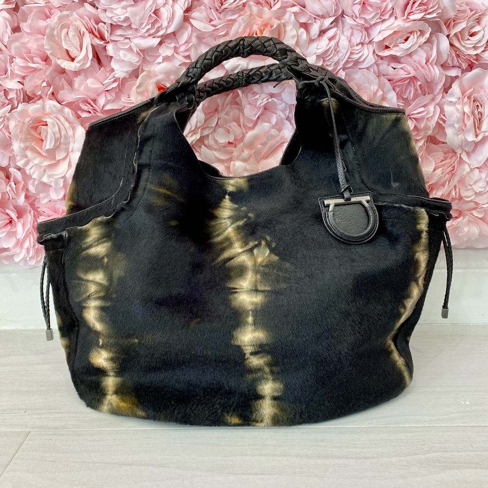 Salvatore Ferragamo Pony cowhide fur and leather Black and Tan hobo bag.